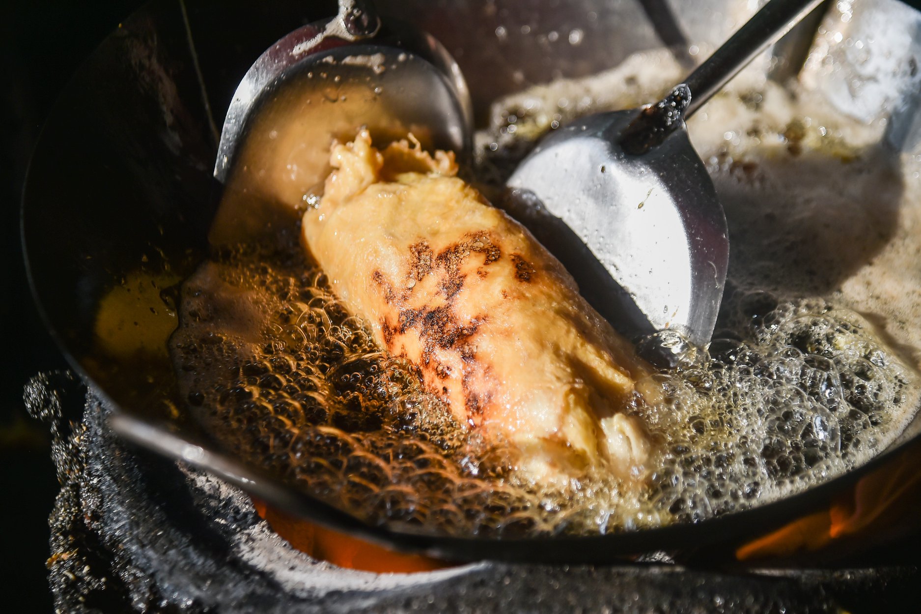 Jay Fai's Street Food Crab Omelette in Bangkok, Thailand. Recommended by Michelin guides.